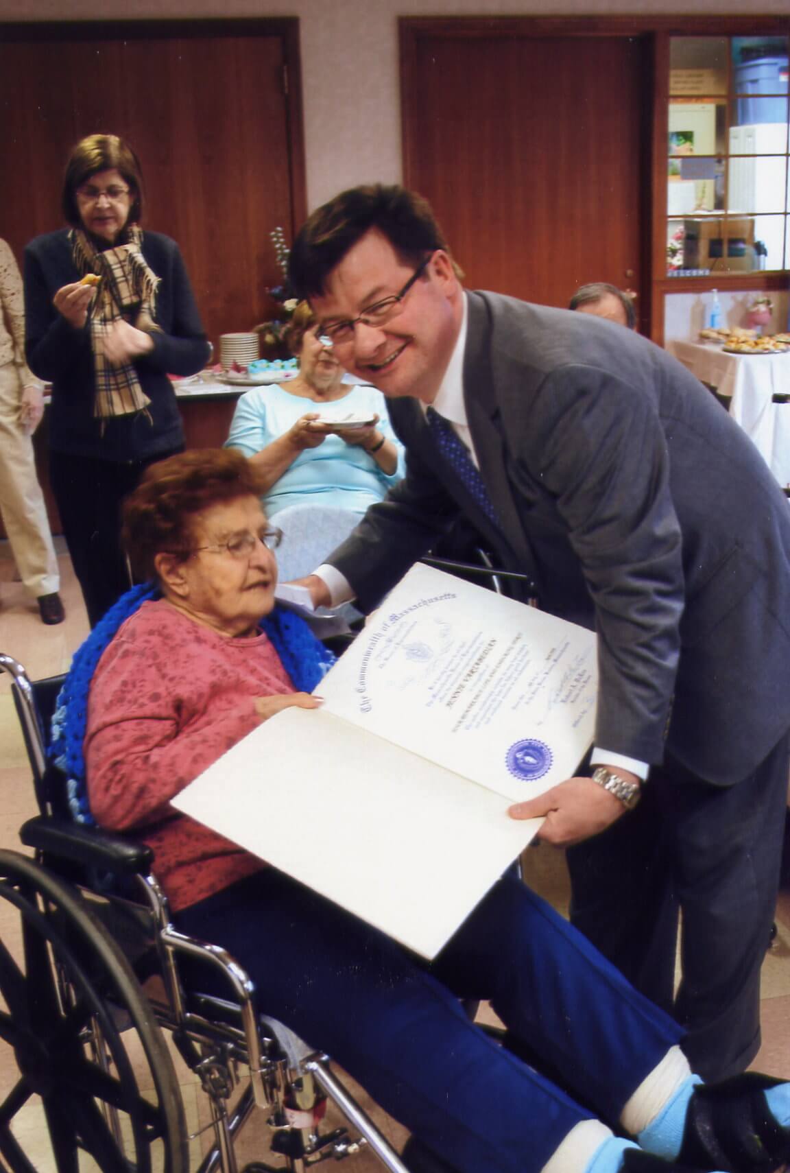 with_brian Massachusetts State Rep. Brian Dempsey presents a citation to Jennie Vartabedian as the last remaining survivor of the Armenian Genocide in Haverhill.