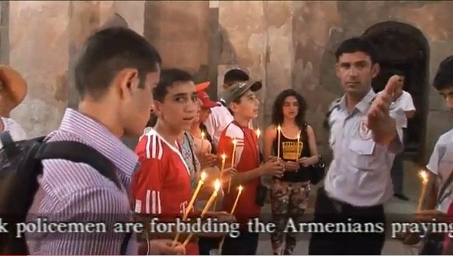 Akhtamar Turkish policeman shows Armenian students singing "Der Voghormia" the door.