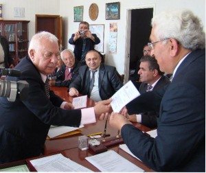Dr. Ghassemian, left, receives honorary doctorate degree from Stepan Dadayan, president of Artsakh State University.